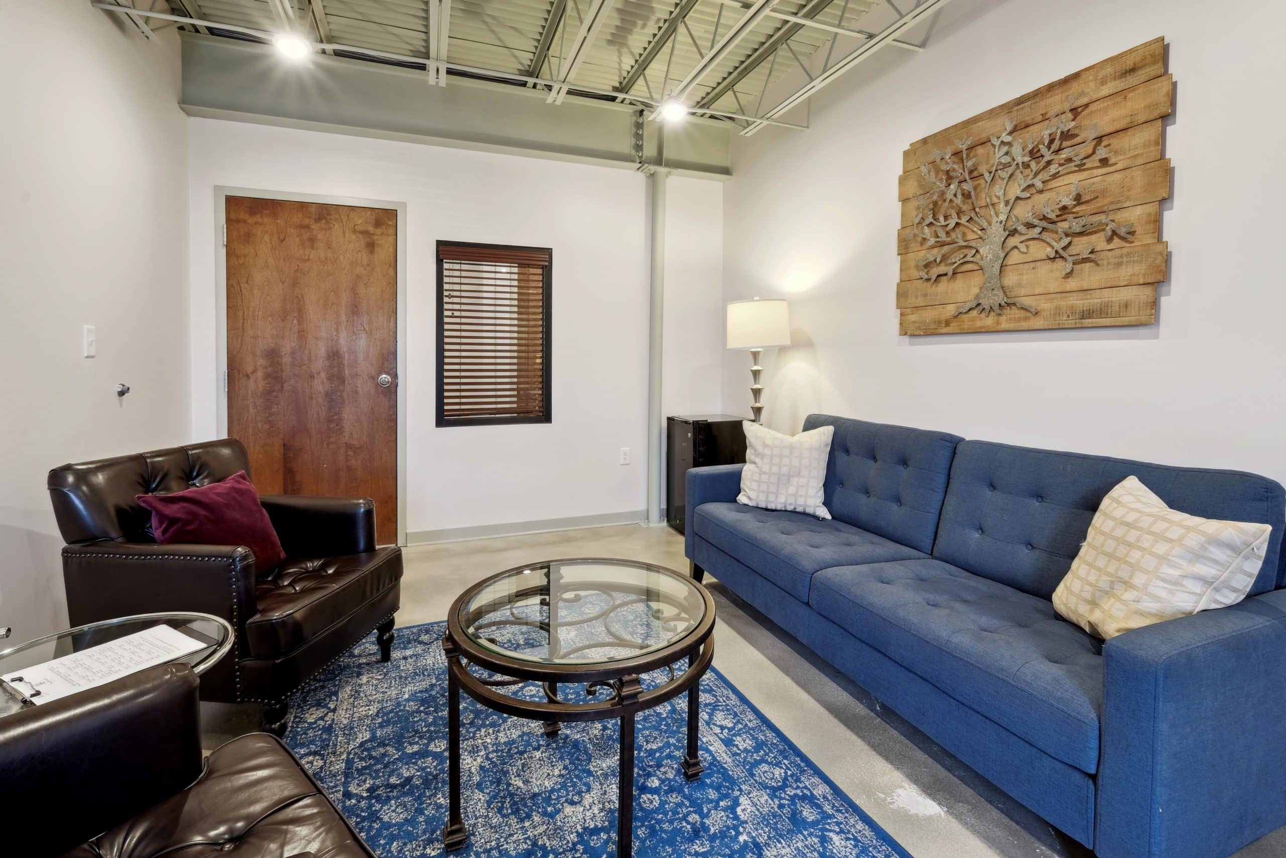 Office with a blue sofa at Longbranch Recovery – Metairie IOP
