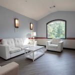 Retreat of Atlanta Community Room with white sofas