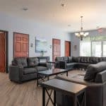 Retreat of Atlanta Community Room with large sofas and tables
