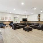 Upstairs common area with sofas and chairs