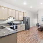 Kitchen and dining area at NORA House sober living facility for female veterans
