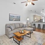 NORA House sober living facility for female veterans living room area with kitchen in the background