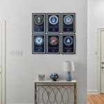 NORA House sober living facility hallway with photos on the wall