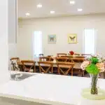 View from the kitchen into the eating area at Eating Disorder Treatment Centers of Louisiana.